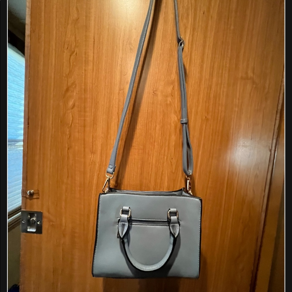 Light blue purse.